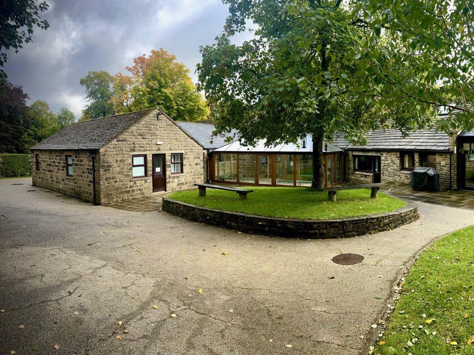 The stone buildings of The Peak Centre at Edale